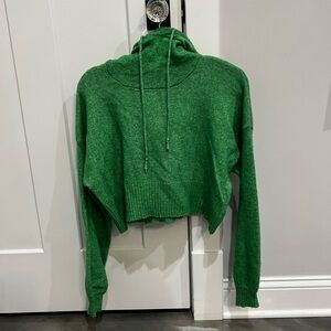 Green hooded sweater